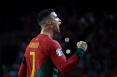 Portugal's Cristiano Ronaldo celebrates after scoring his side's second goal from the penalty spot during the Euro 2024 group J qualifying soccer match between Portugal and Slovakia at the Dragao stadium in Porto, Portugal, Friday, Oct. 13, 2023. (AP Photo/Luis Vieira)
- XEURO2024X
