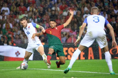 Portugal's Goncalo Ramos vies for the ball with Slovakia's Milan Skriniar, left, during the Euro 2024 group J qualifying soccer match between Portugal and Slovakia at the Dragao stadium in Porto, Portugal, Friday, Oct. 13, 2023. (AP Photo/Luis Vieira)
- XEURO2024X